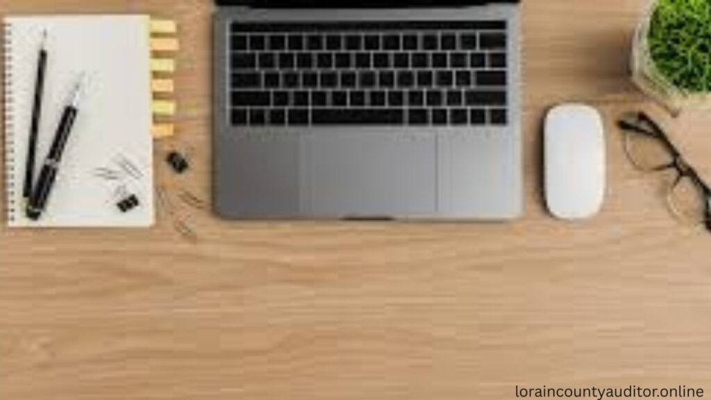 Property research materials showing Lorain County Auditor parcel search results including tax assessments, deeds and comparable sales data